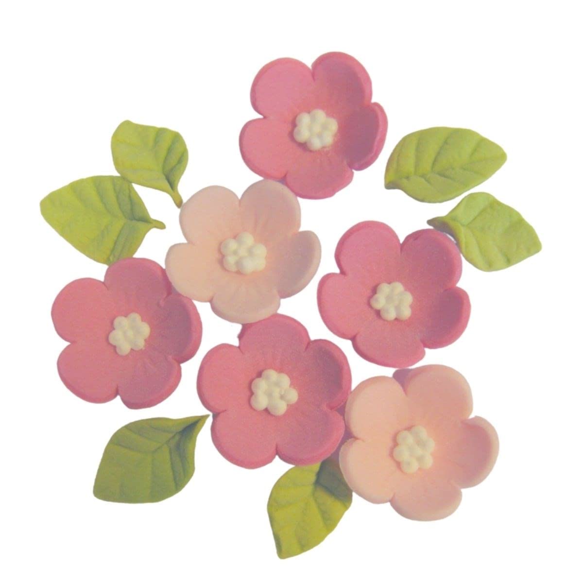 Mit Liebe gebacken – handgemachte essbare Cupcake-Dekorationen aus Zucker mit Blumen und Blättern