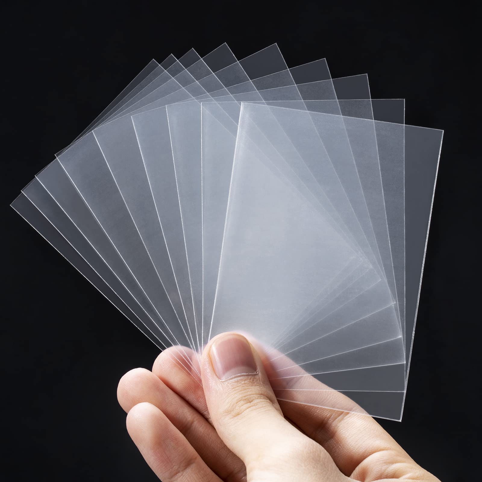 Carehabi Pack of 100 Trading Card Sleeves 66 x 92 mm 0.1 mm Thick Clear Protective Sleeves 4