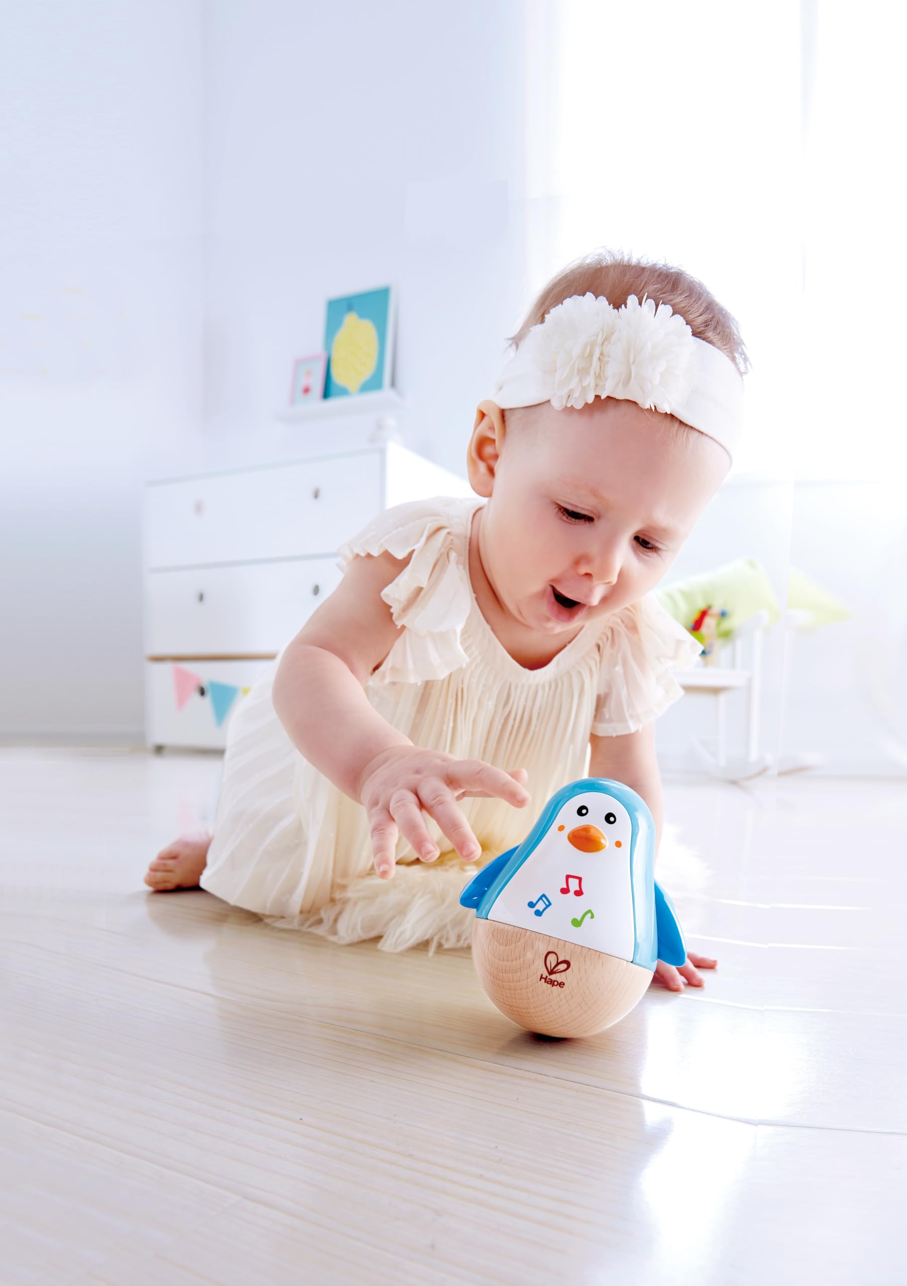 Hape Penguin Musical Wobbler - Roly-Poly Toy with Soothing Tinkling Sounds for Babies 6 Months+ 7