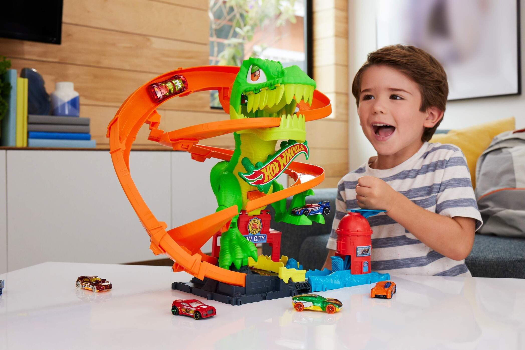Hot Wheels City T-Rex Blaze Battle Playset with 1:64 Scale Die-Cast Fire Engine | Ages 4+