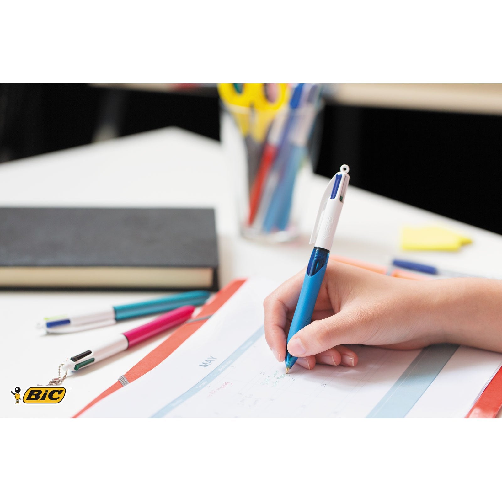 BIC 4 Colours Retractable Ballpoint Pens - Medium 1.0mm Point, Comfort Grip, Assorted Ink, Pack of 3 Blue Barrels